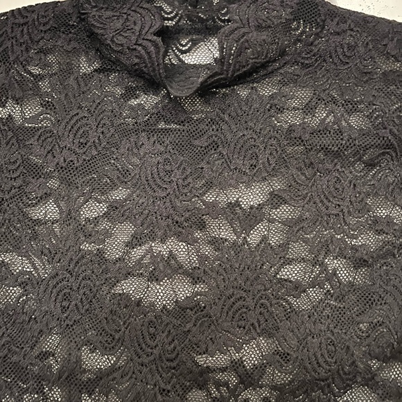 Black Lace long sleeve Top. Size: Med
Great condition; only worn one time. - Picture 5 of 8